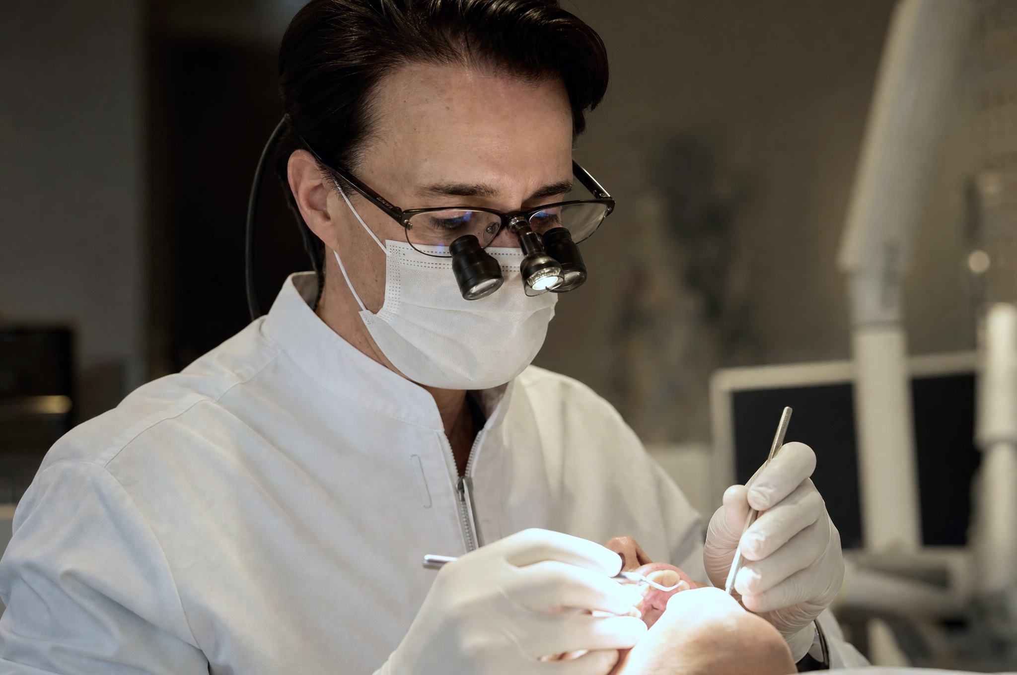 Dr. Cristea performing implant surgery